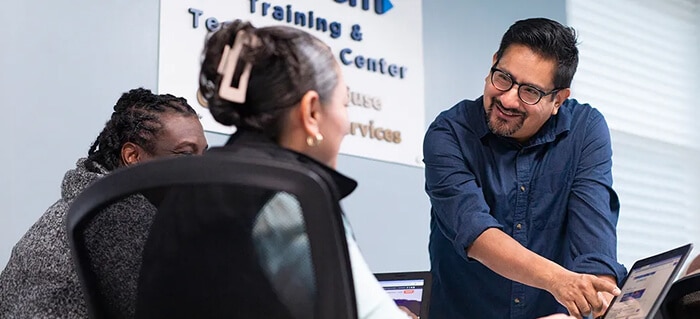 A community learning at a Spectrum digital education center