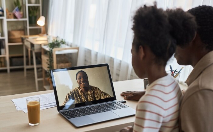 Military mom using Spectrum Internet to video-chat with her husband and daughter.
