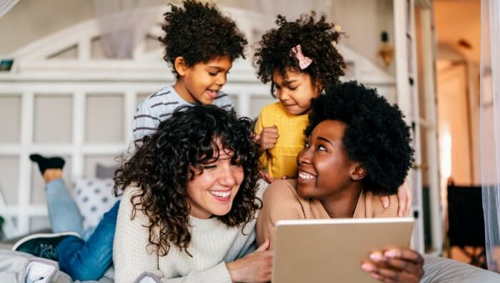 A family enjoying time together with a tablet