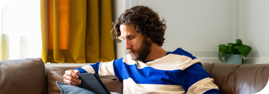 A man looking at Spectrum's resident benefits