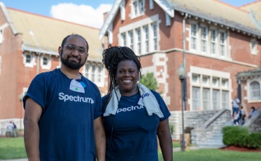 Spectrum volunteers smiling