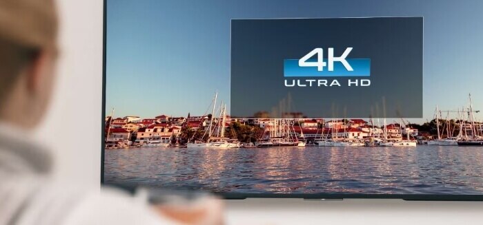 A person watching 4K content on their TV with Spectrum TV