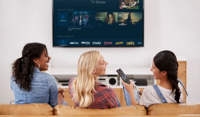 Young women watching tv
