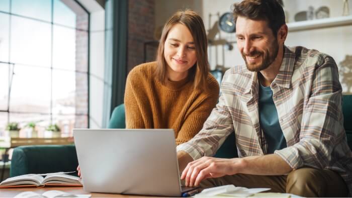 Couple using a laptop