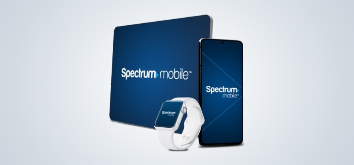 A smart phone, tablet and smartwatch with Spectrum Mobile on their screens