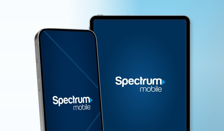 Two cell phones featuring the Spectrum Mobile logo.