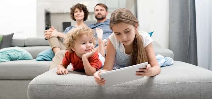 a family enjoying Spectrum Internet in their living room