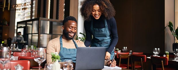 Smiling coffee shop employees
