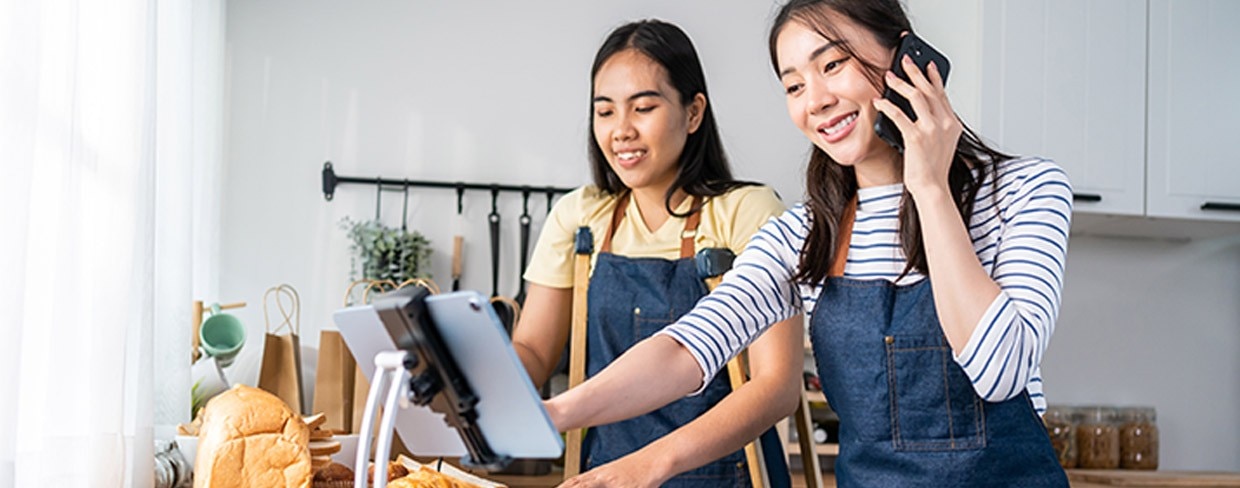 Asian Female Baking at a Bakery