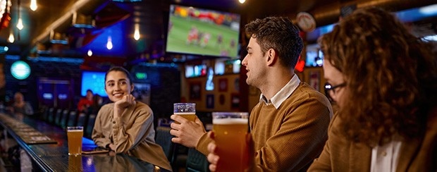 Bar patrons conversing