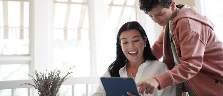 A family setting up their smart home using Spectrum Internet