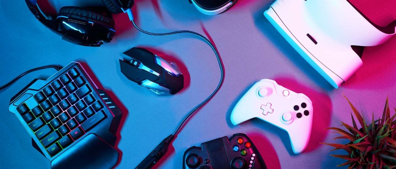 Gaming controllers, VR goggles, computer keyboard, mouse and headset.