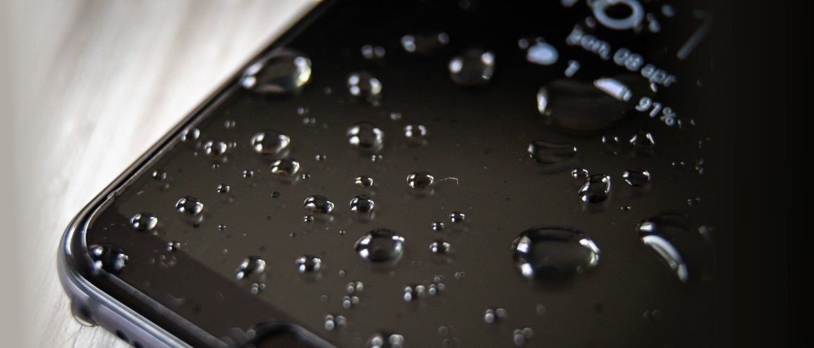 iPhone with water droplets on it